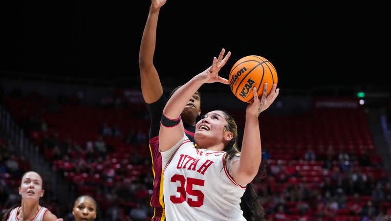 Utah forward Alissa Pili (35) drives to the basket during the Utes’ 78-58 win over the USC Trojans at the Huntsman Center in Salt Lake City on Friday, Jan. 19, 2024.