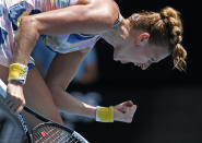 Petra Kvitova of the Czech Republic reacts after winning a point against Greece's Maria Sakkari during their fourth round singles match at the Australian Open tennis championship in Melbourne, Australia, Sunday, Jan. 26, 2020. (AP Photo/Andy Wong)