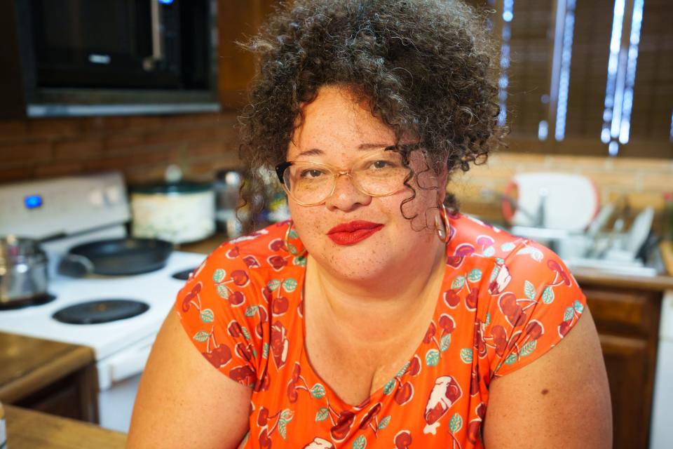 Board chair of the National Association to Advance Fat Acceptance, Tigress Osborne, poses for a photo in her home on June 9, 2022 in Chandler, AZ.