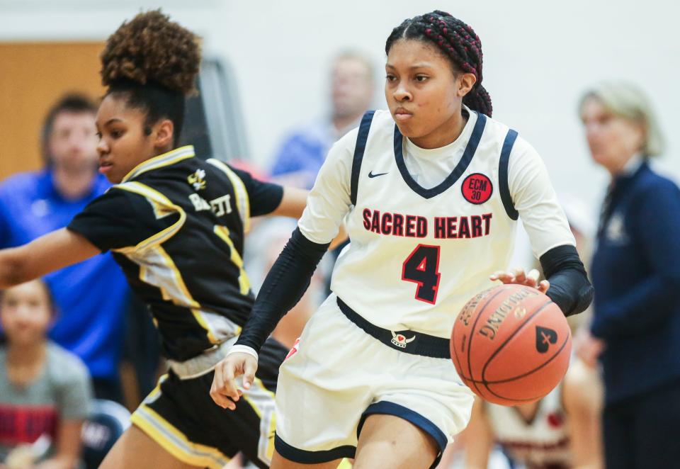 Triniti Ralston drives during a game against visiting Central High School in February 2022. Ralston was instrumental in the Valkyries' 2021 state championship.