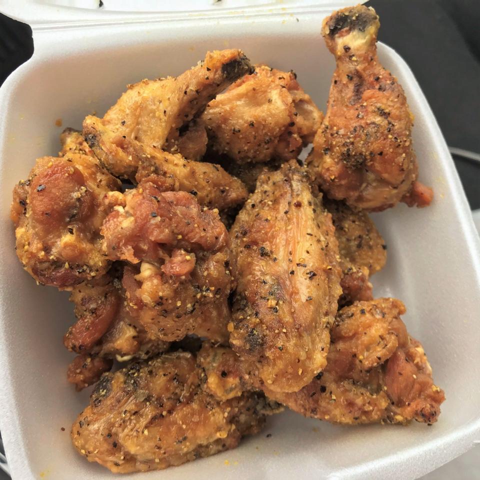 Lemon Pepper wings come "naked" or fused with Buffalo sauce at Wings Supreme in Oklahoma City.