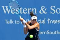 Aug 18, 2017; Mason, OH, USA; Garbine Muguruza (ESP) returns a shot against Svetlana Kuznetsova (RUS) during the Western and Southern Open at the Lindner Family Tennis Center. Aaron Doster-USA TODAY Sports