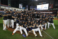 Houston Astros pose after winning Game 6 of baseball's American League Championship Series against the New York Yankees Saturday, Oct. 19, 2019, in Houston. The Astros won 6-4 to win the series 4-2. (AP Photo/Matt Slocum)