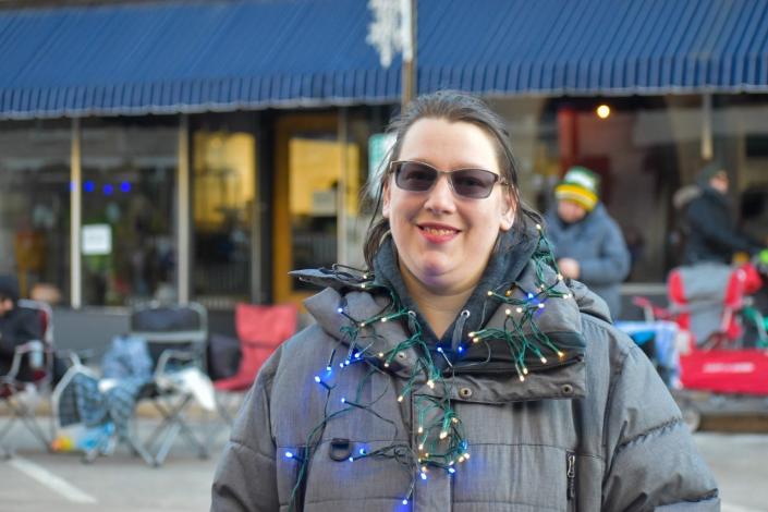 For Kimberly Quartullo, the chaos of last year's parade looked like &quot;a silent movie.&quot; Because she is deaf, she could only hear the screams of the crowd with the help of her hearing aid. She's back this year, just as she attends every year, to help keep the community strong.