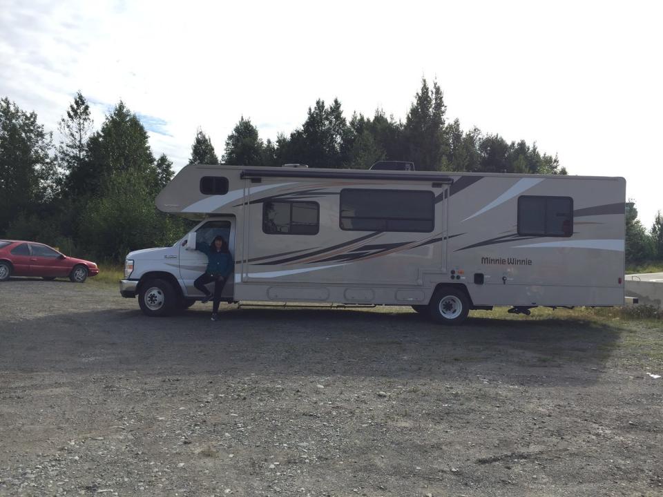 The author and the 33-foot RV she drove through Alaska. (Photo: Courtesy of Ann Brenoff)