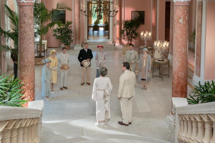 (From left) Imelda Staunton as Lady Bagshaw, Tuppence Middleton as Lucy Branson, Allen Leech as Tom Branson, Hugh Bonneville as Robert Grantham, Elizabeth McGovern as Cora Grantham, Harry Hadden-Paton as Bertie Pelham, Laura Carmichael as Lady Edith Crawley, Nathalie Baye as Madame Montmirail, and Jonathan Zuccäi as Monsieur Montmirail in Downton Abbey: A New Era.