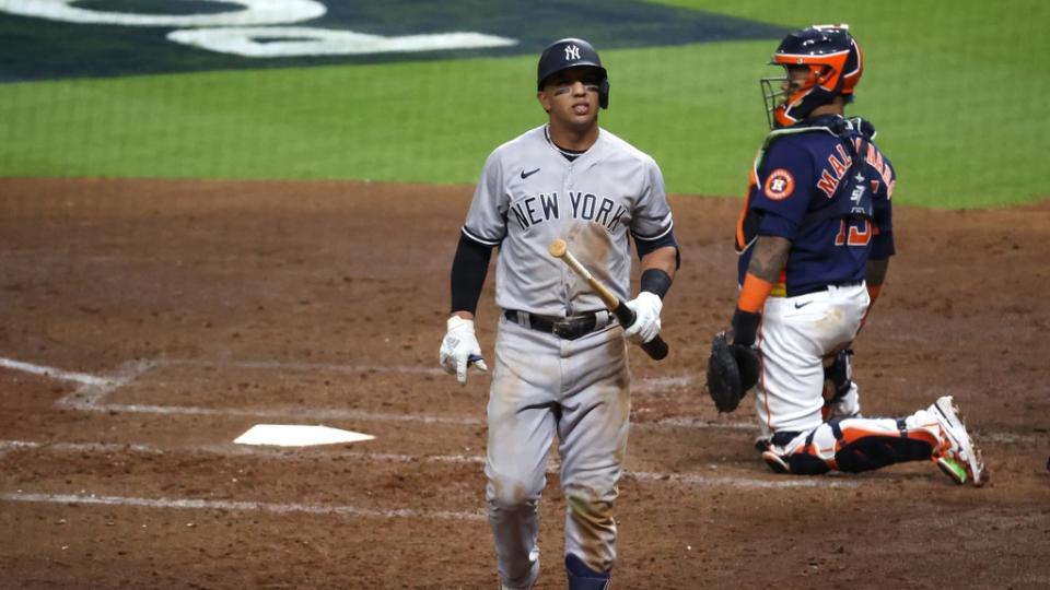 New York Yankees shortstop Oswald Peraza (left) reacts after striking out during the fifth inning against the Houston Astros during game two of the ALCS for the 2022