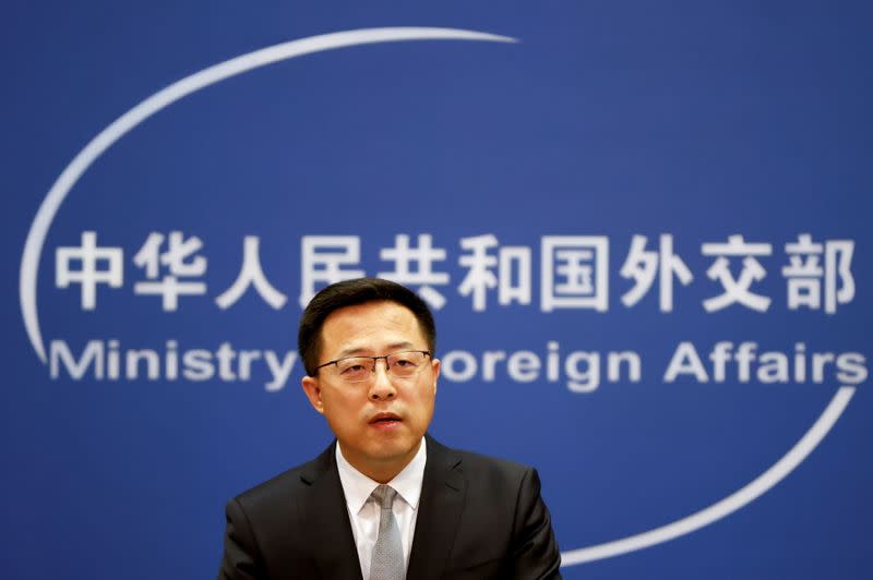 FILE PHOTO: China's foreign ministry spokesperson Zhao Lijian attends a news conference in Beijing