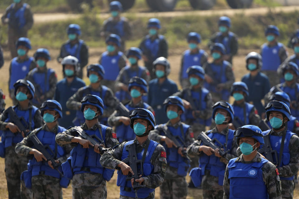 Chinese United Nations troop take part in the Shared Destiny 2021 drill at the Queshan Peacekeeping Operation training base in Queshan County in central China's Henan province Wednesday, Sept. 15, 2021. Peacekeeping troops from China, Thailand, Mongolia and Pakistan took part in the 10 days long exercise that field reconnaissance, armed escort, response to terrorist attacks, medical evacuation and epidemic control. (AP Photo/Ng Han Guan)