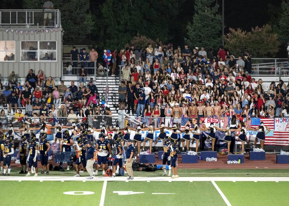 Gregori students and cheer team celebrate a touchdown during the non league game at Gregori High School in Modesto, Calif., Friday, September 8, 2023.