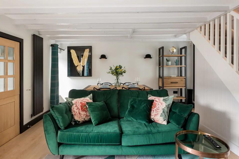 <p>Set within reach of dreamy South Hams beaches and the Dartmoor National Park, this intimate hideaway is ideal for combining the coast and country for a heavenly escape to Devon. You can sink into the emerald velvet sofa, light the log burner, curl up in the window seat and have a thoroughly relaxing time.</p><p><strong>Sleeps: </strong>4</p><p> <strong>Make sure you... </strong>head out for a pub lunch in the nearby village of Brixton. </p><p><a class="link " href="https://airbnb.pvxt.net/EajQyP?trafcat=summer" rel="nofollow noopener" target="_blank" data-ylk="slk:BOOK HERE;elm:context_link;itc:0;sec:content-canvas">BOOK HERE</a></p>