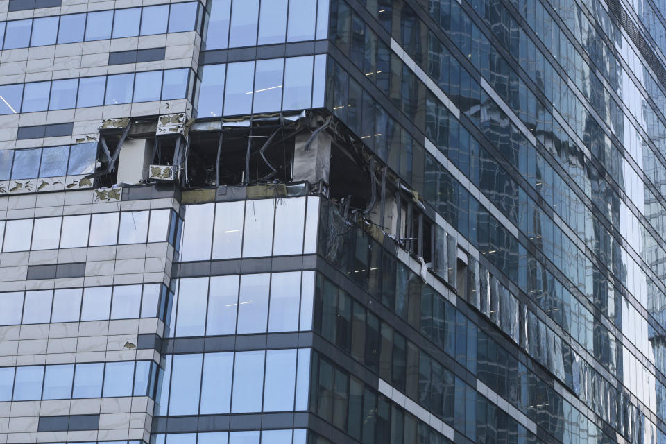 A view of the damaged skyscraper in the "Moscow City" business district after a reported drone attack in Moscow, Russia, early Sunday, July 30, 2023. (AP Photo)