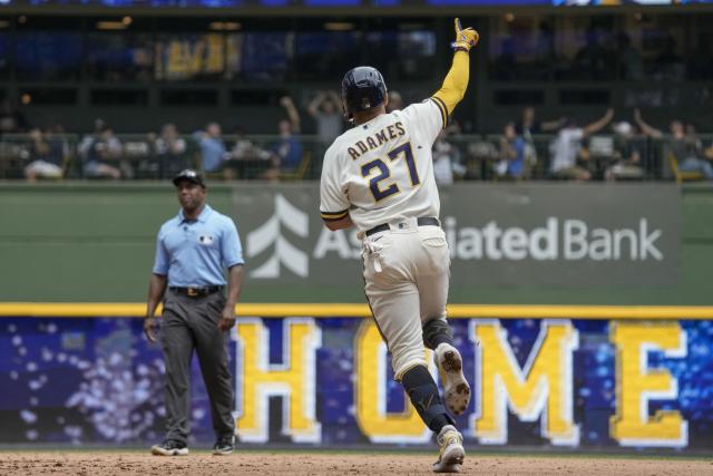 Brewers beat Rockies 7-6 in 10 innings as Mark Canha scores