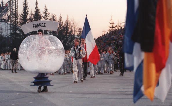 <p>The opening ceremony includes dramatic dance numbers by performers clad in unusual snow globe-inspired costumes. </p>