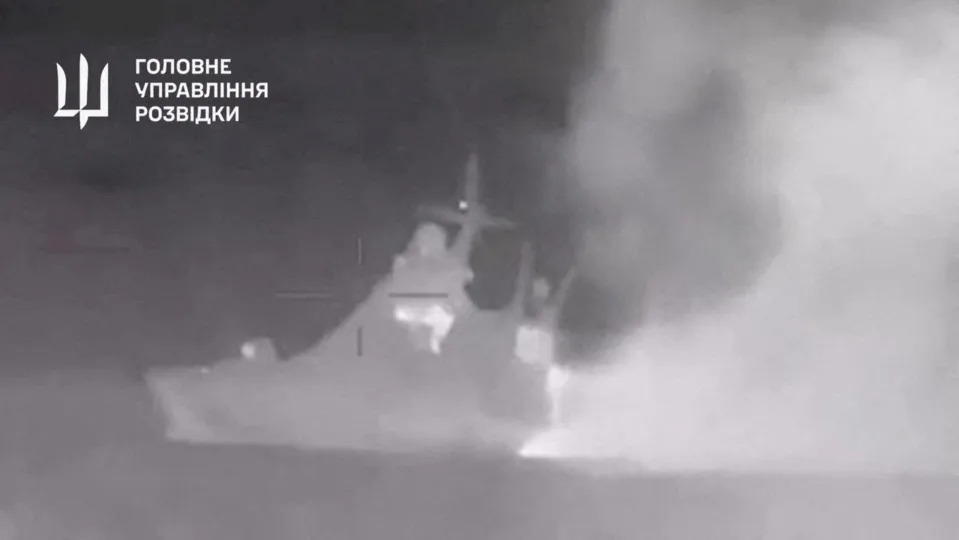 Handout footage shows smoke rising from what Ukrainian military intelligence said is the Russian Black Sea Fleet patrol ship Sergey Kotov that was damaged by Ukrainian sea drones, at sea, at a location given as off the coast of Crimea, in this still image obtained from a video released on March 5, 2024.