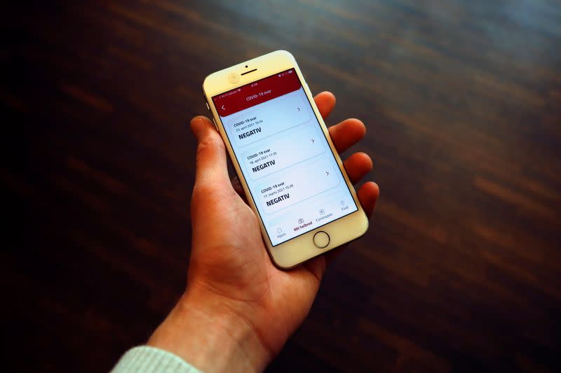 A cell phone with the COVID-19 passport app, in Copenhagen