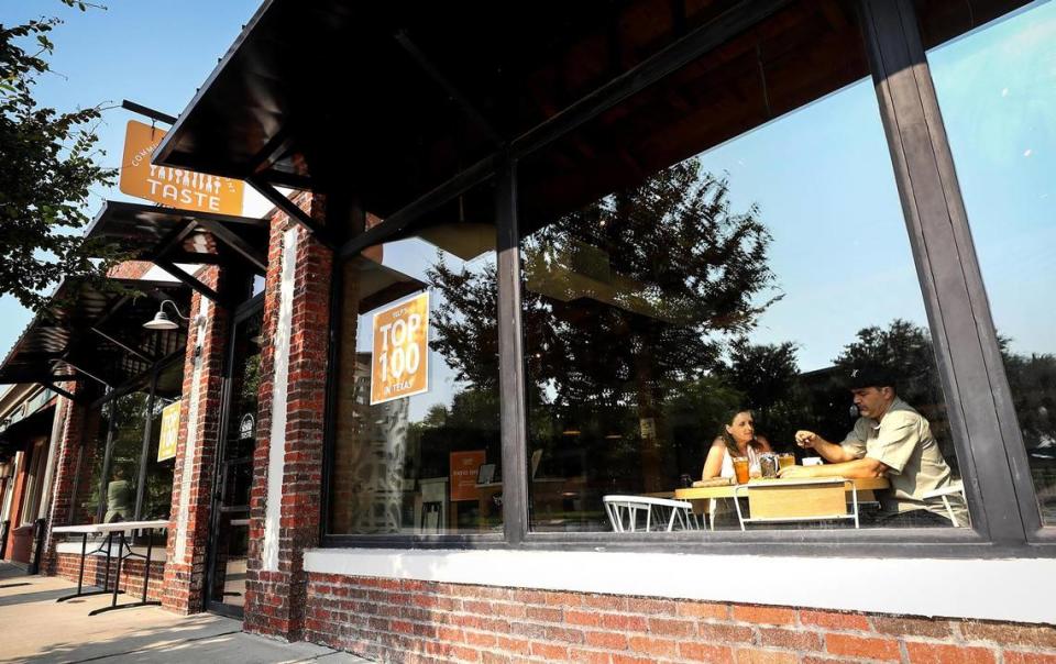 Guests eat at Taste Project on Wednesday, July 20, 2021, in Fort Worth. Taste Project is a nonprofit created to address food insecurity. The restaurant provides healthy food without a price tag, asking costumers to pay what they can afford.