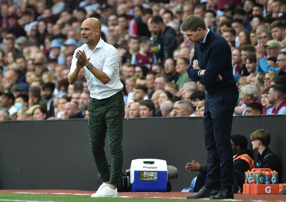 Manchester City's head coach Pep Guardiola, left, and Aston Villa's head coach Steven Gerrard (AP)