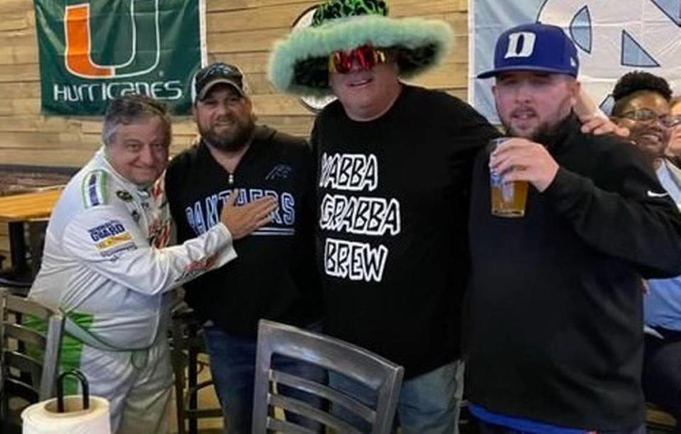 Mark Baker, at left, with — from left to right — Chris "Mac" McClain, Dave Ballard (aka Sir Loin of Beef, another famous caller to the show), and Travis "T-Bone" Hancock.