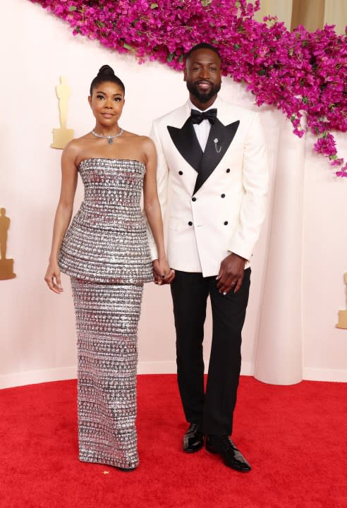 HOLLYWOOD, CALIFORNIA – MARCH 10: (L-R) Gabrielle Union-Wade and Dwyane Wade attend the 96th Annual Academy Awards on March 10, 2024 in Hollywood, California. (Photo by Kevin Mazur/Getty Images)