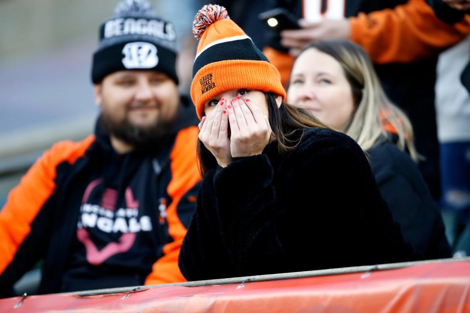 Cincinnati Bengals fans watch as another Bengals drive stalls in the fourth in the fourth quarter of the NFL Week 13 game between the Cincinnati Bengals and the Los Angeles Chargers at Paul Brown Stadium in Cincinnati on Sunday, Dec. 5, 2021. The Chargers coasted to a 41-22 win over the Bengals. 