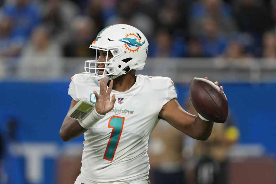 Miami Dolphins quarterback Tua Tagovailoa throws during the first half of an NFL football game against the Detroit Lions, Sunday, Oct. 30, 2022, in Detroit. (AP Photo/Paul Sancya)