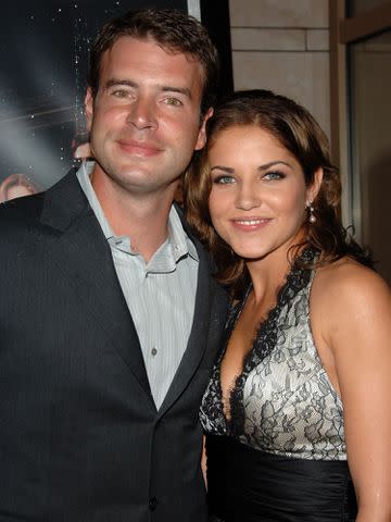 <p>Stephen Shugerman/Getty </p> Scott Foley and Marika Dominczyk attend the premiere party for NBC's "Heist".