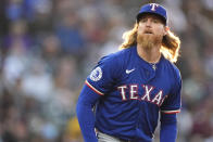 Texas Rangers starting pitcher Jon Gray follows through with a pitch in the fourth inning of a baseball game against the Colorado Rockies, Friday, May 10, 2024, in Denver. (AP Photo/David Zalubowski)