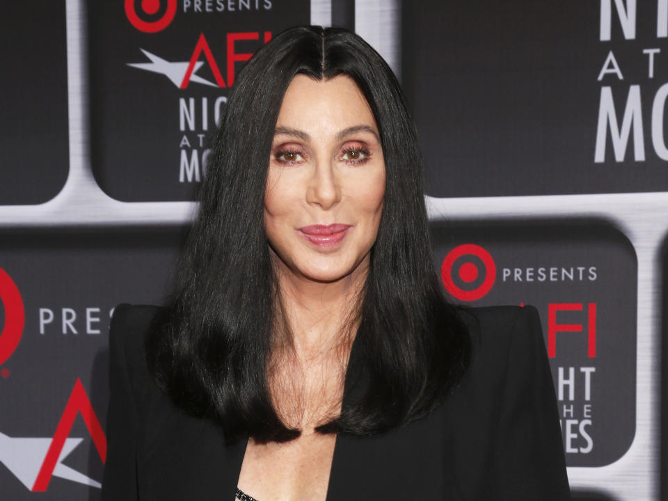 FILE - This April 24, 2013 file photo shows performer Cher at the AFI Night at the Movies at the ArcLight in Los Angeles. Cher will be performing on the singing competition series "The Voice" during the season finale on Tuesday, June 18. She will perform “Woman’s World” the first single off of her upcoming album. (Photo by Todd Williamson/Invision/AP, file)