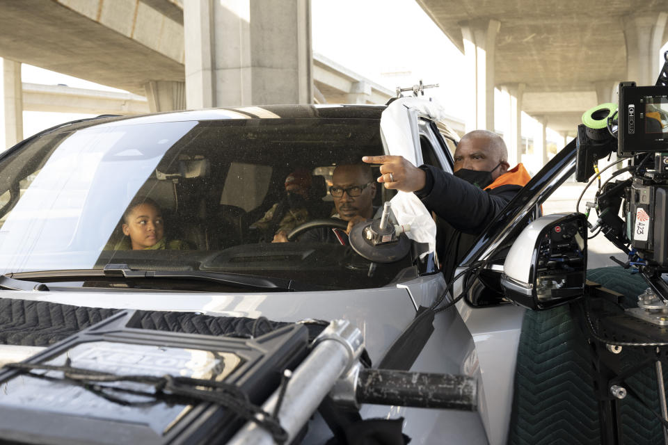 Director Reginald Hudlin and Eddie Murphy as 'Chris Carver' on the set of Candy Cane Lane
(Claudette Barius/Prime Video)