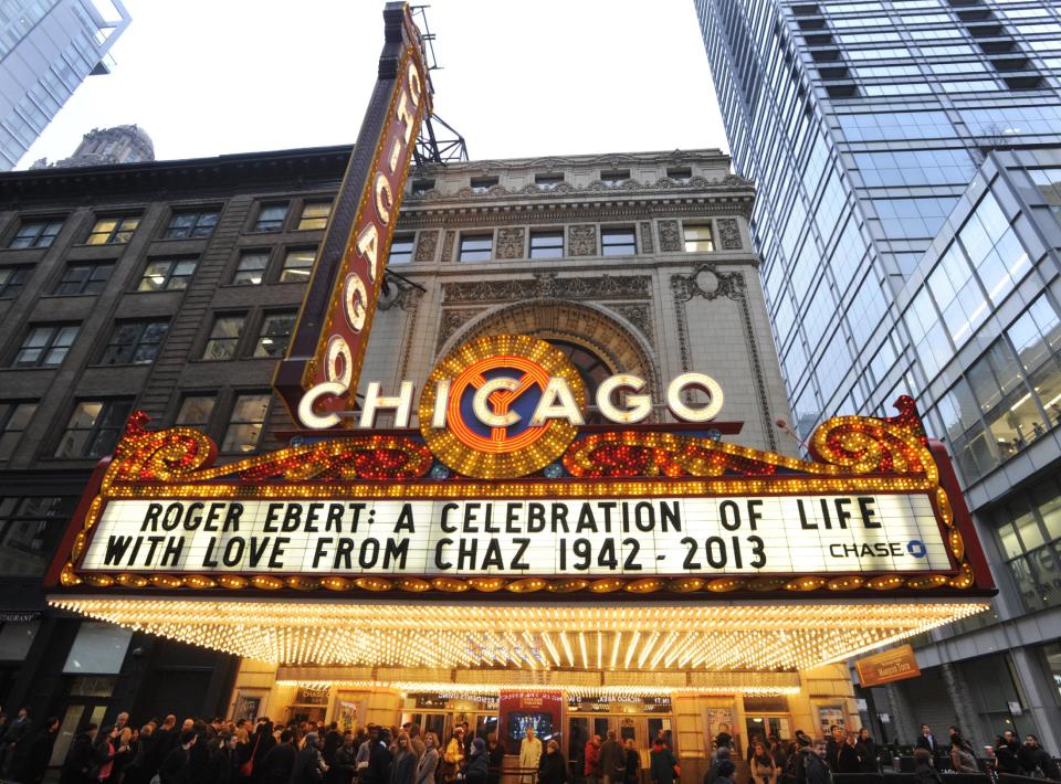 The Chicago Theater marquee before a memorial for film critic Roger Ebert in Chicago, Thursday, April 11, 2013. The Pulitzer Prize winning critic died last week at the age of 70 after a long battle with cancer. (AP Photo/Paul Beaty)
