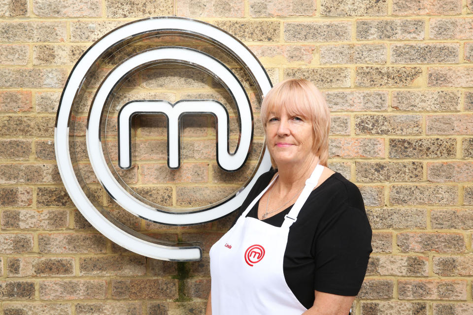 Linda returned to the MasterChef kitchen and brought her naked calendar to show John and Gregg. (BBC)