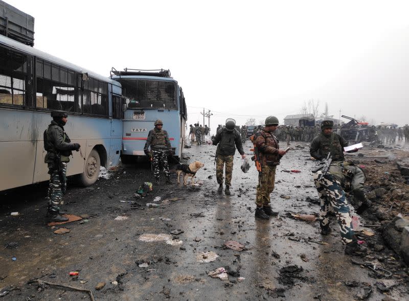 FILE PHOTO: Indian soldiers examine the debris after an explosion in Lethpora in south Kashmir's Pulwama district