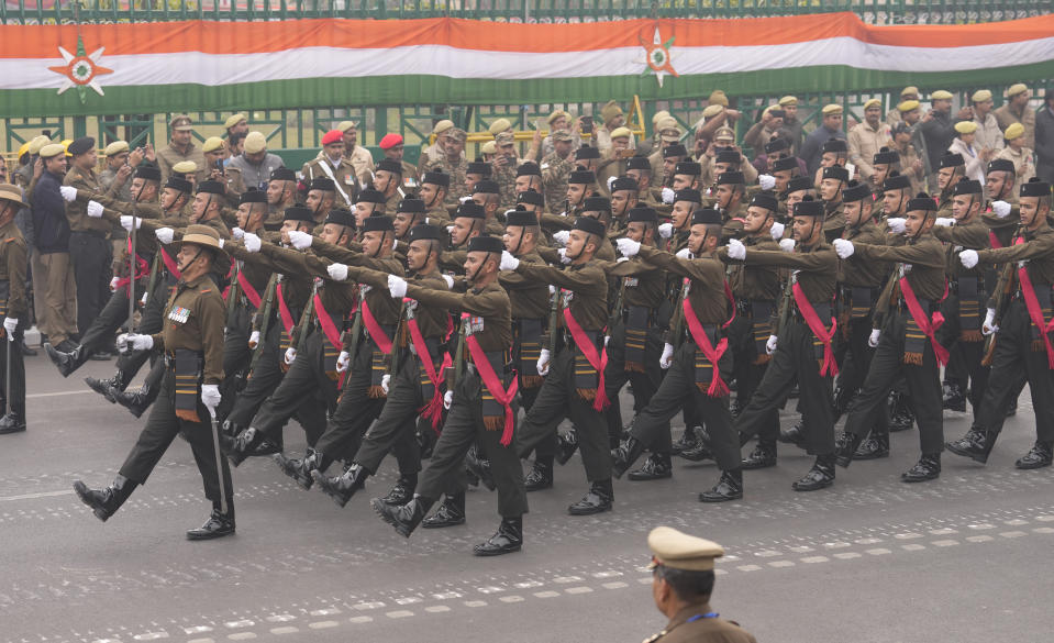 Indian army soldiers march in front of the Vidhan Sabha during the Republic Day parade in Lucknow, capital of northern Indian state of Uttar Pradesh, Friday, Jan. 26, 2024. (AP Photo/Rajesh Kumar Singh)