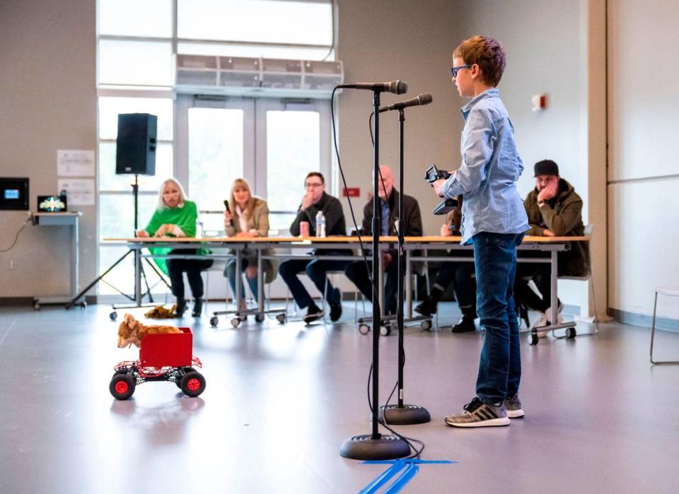 Pioneer Elementary fifth grader Jeremy N. presents his invention called “Pet Car” to his peers while competing in the 2023 3D Print & Design “Shark Tank” Competition at the school in Gig Harbor, Wash. on May 5, 2023. Jeremy won first place and became Pioneer Elementary’s innovator of the year.