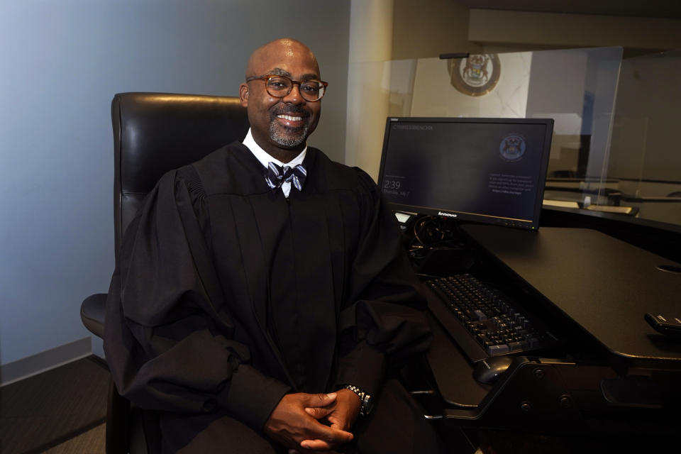 Michigan's 36th District Court Chief Judge William McConico is photographed in his office, Thursday, July 7, 2022, in Detroit. McConico is at the center of brokering a settlement in a class action lawsuit over the use of cash bail in Detroit. Advocates say the agreement is a win for racial justice in the criminal justice system, and could be modeled across Michigan and in states nationwide. (AP Photo/Carlos Osorio)