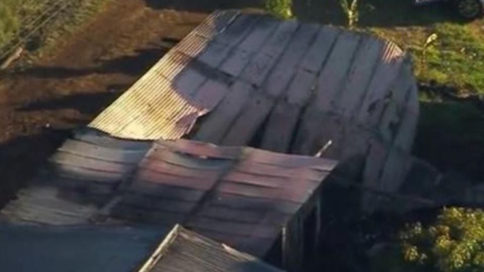 The caravan was destroyed in the blaze, with parts of the roof collapsed. Picture: 9 News