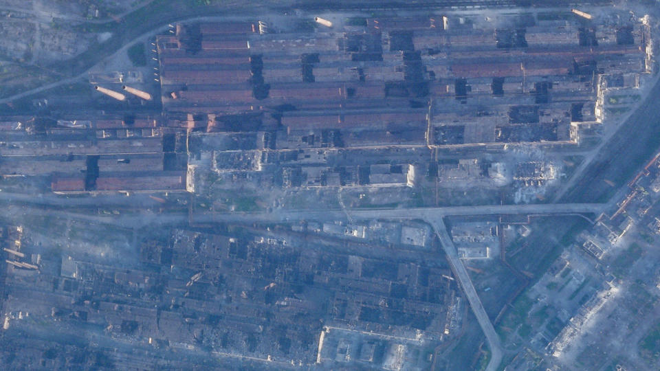 This satellite image taken by Planet Labs PBC shows damage at the Azovstal steelworks in Mariupol, Ukraine, Wednesday, May 4, 2022. Russian forces began storming the bombed-out steel mill in Mariupol on Tuesday, May 3, 2022. The renewed push to take the mill came after scores of civilians were evacuated from the plant's underground tunnels after enduring weeks of shelling. (Planet Labs PBC via AP)