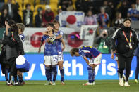 Japan's players celebrate at the end of the Women's World Cup Group C soccer match between Japan and Spain in Wellington, New Zealand, Monday, July 31, 2023. (AP Photo/John Cowpland)