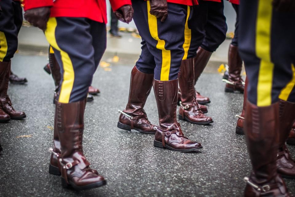 RCMP officers march together in November 2017.