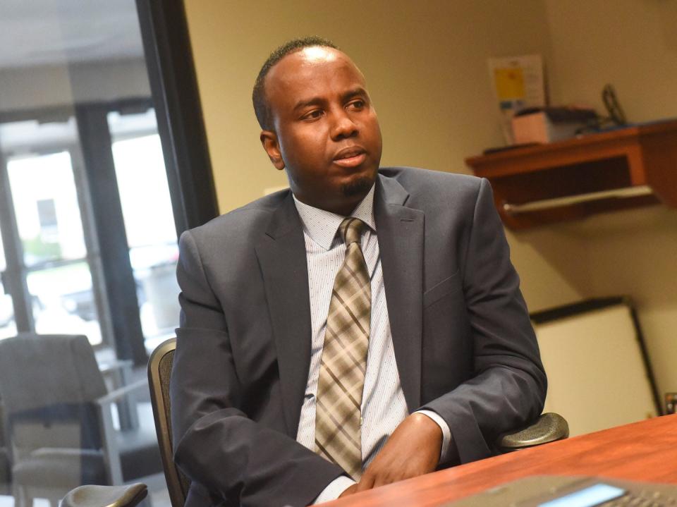 Mohamed Farah, Community Development Coordinator at Stearns Bank, speaks during an interview Wednesday, May 25, 2022, in St. Cloud.