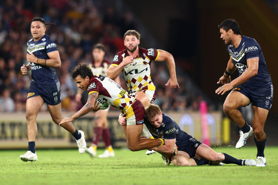 BRISBANE, AUSTRALIA - MARCH 29: Tristan Sailor
of the Broncos is tackled during the round four NRL match between Brisbane Broncos and North Queensland Cowboys at Suncorp Stadium, on March 29, 2024, in Brisbane, Australia. (Photo by Chris Hyde/Getty Images)