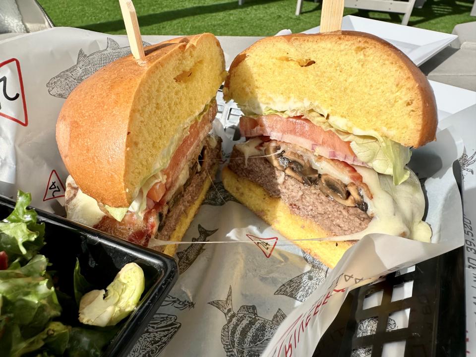 The mushroom burger at M24 Riverfront Grille on Merritt Island was prettily executed, with not too much lettuce, tomato, an actual slice of crisp red onion, bacon, mushrooms, gooey cheese and a thick burger served on a first-rate, brioche-style hamburger roll.