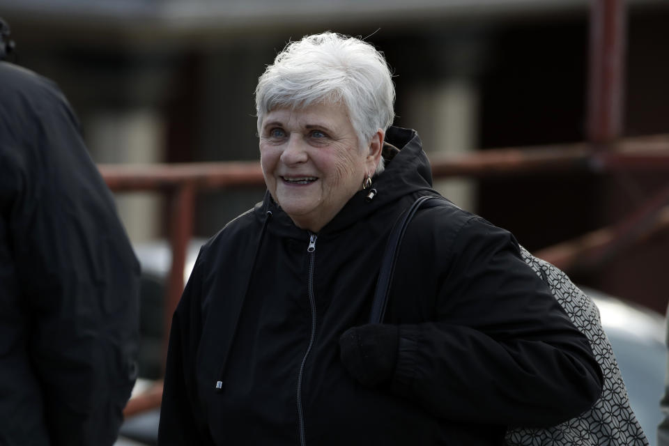 The wife of former Penn State University assistant football coach Jerry Sandusky, Dottie Sandusky, leaves the Centre County Courthouse after attending a resentencing hearing on his 45-count child sexual abuse conviction Friday, Nov. 22, 2019. (AP Photo/Gene J. Puskar)