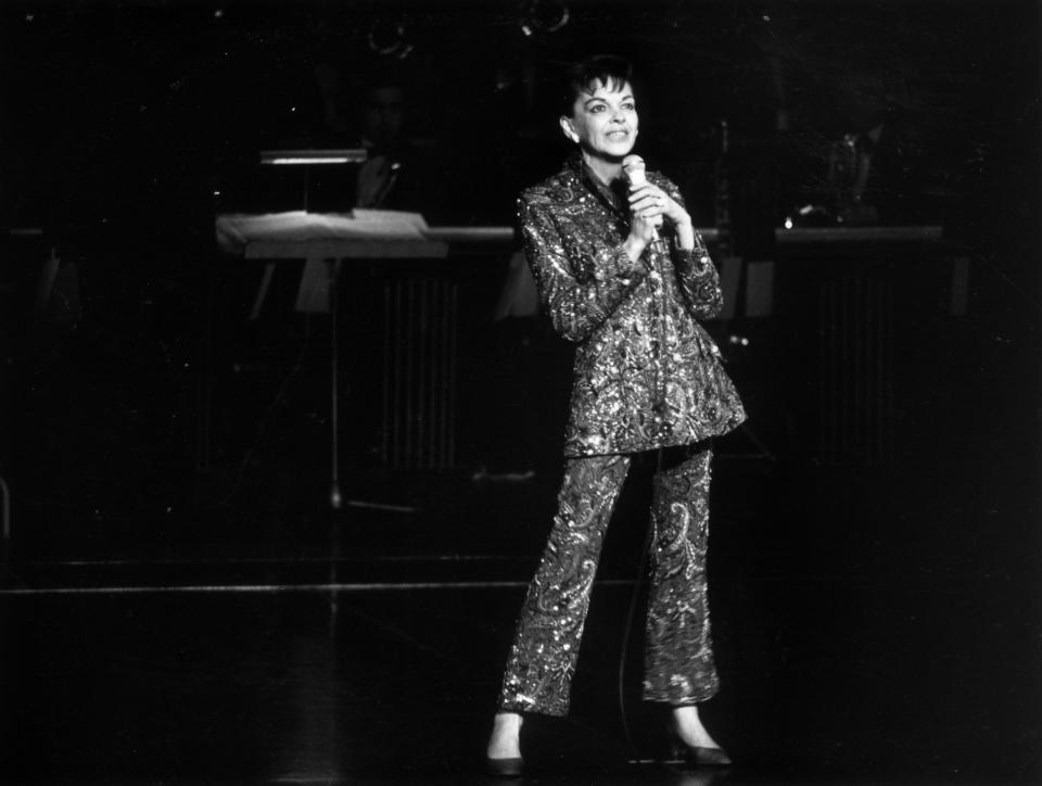 31st December 1968:  Film star and singer Judy Garland (1922 - 1969) performing on stage.  (Photo by Larry Ellis/Express/Getty Images)