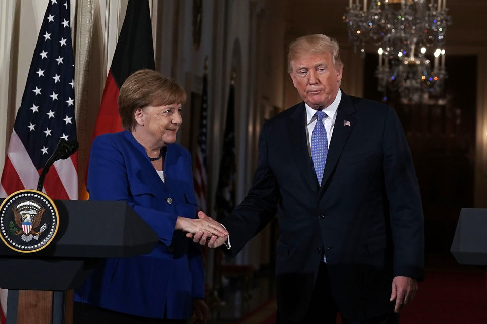 The vibe between President Trump and German Chancellor Angela Merkel was off. (Photo: Getty Images)