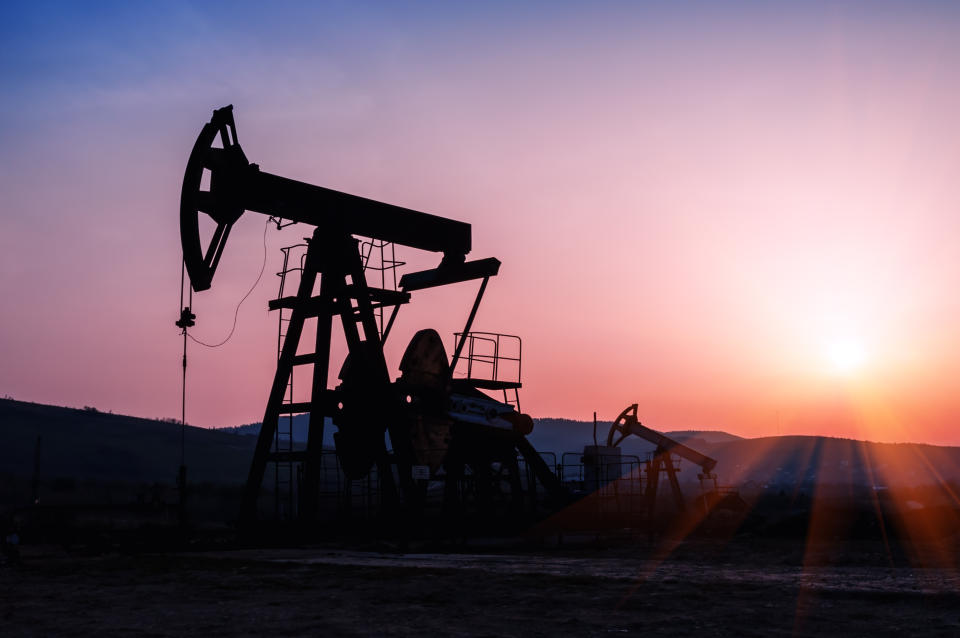 oil pump silhouette on the beautiful red sunset