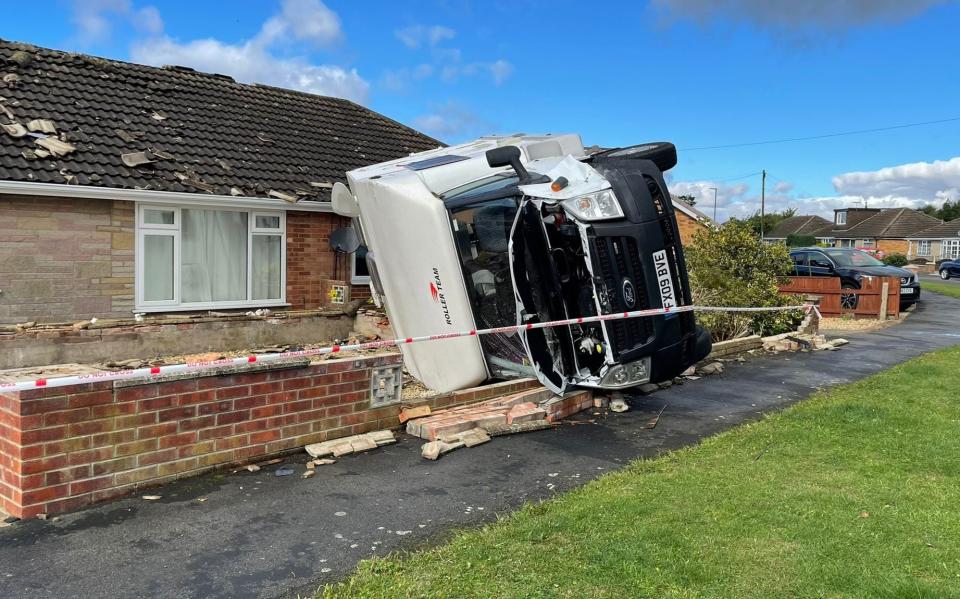 A motorhome was flipped on its side and crashed through the perimeter wall outside a home near Humberton - MEN MEDIA