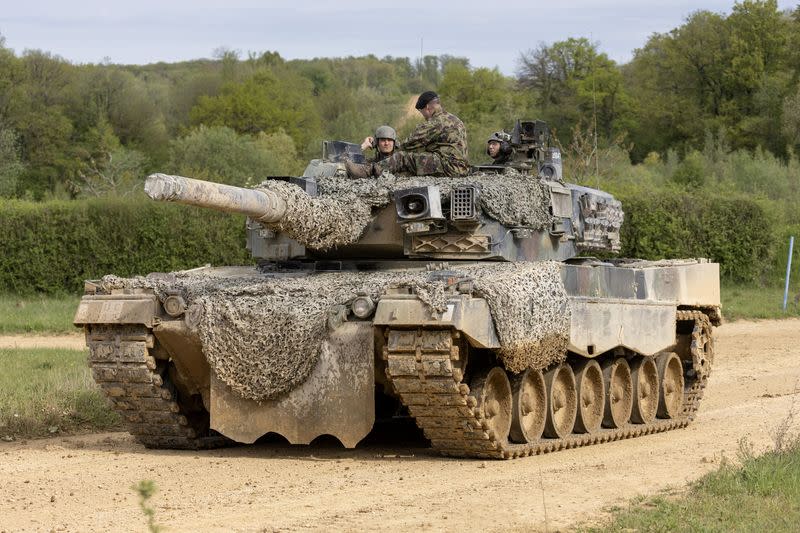 FILE PHOTO: Recruits of the Swiss army Tank School 21 perform an attack exercise with the Leopard 2 tank in Bure