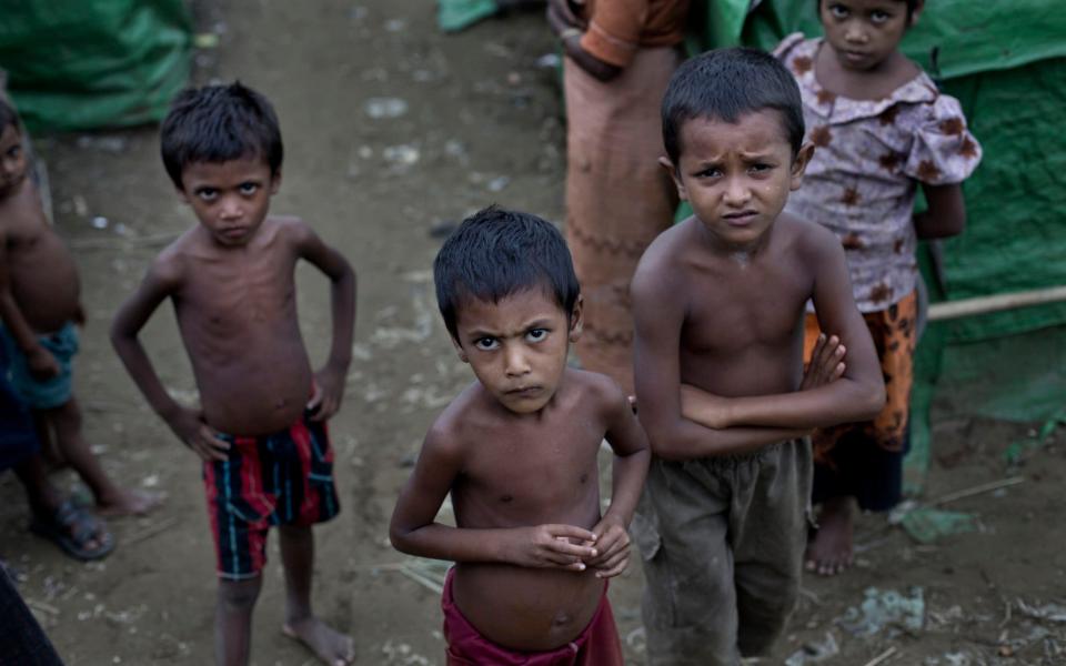 Rohingya children in 2014 in a camp for Muslim refugees in Rakhine state - Gemenu Amarasinghe/AP